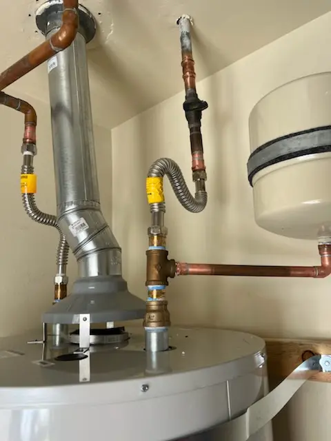 Water heater installation and plumbing repair in Wilgus